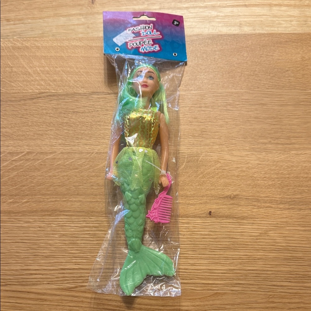 Fashion Doll with Green Tail and Gold Top